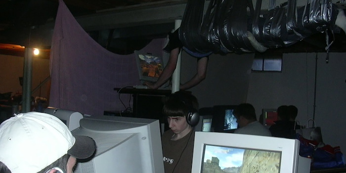 The duct tape gamer hanging from the ceiling reaches legend status. Source: kotaku.com