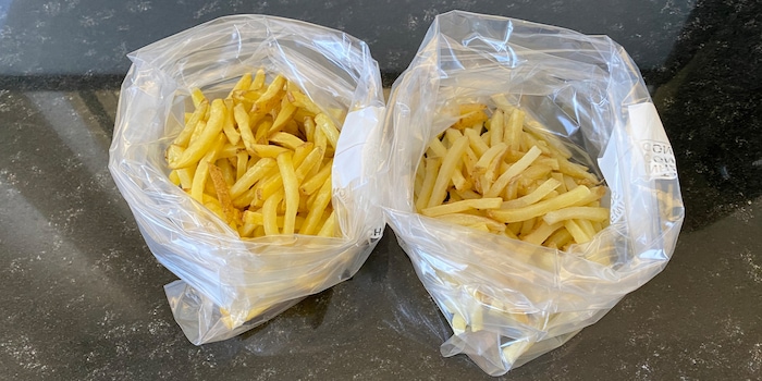 My parboiled and deep-fried homemade chips are waiting to spend the night in the freezer.